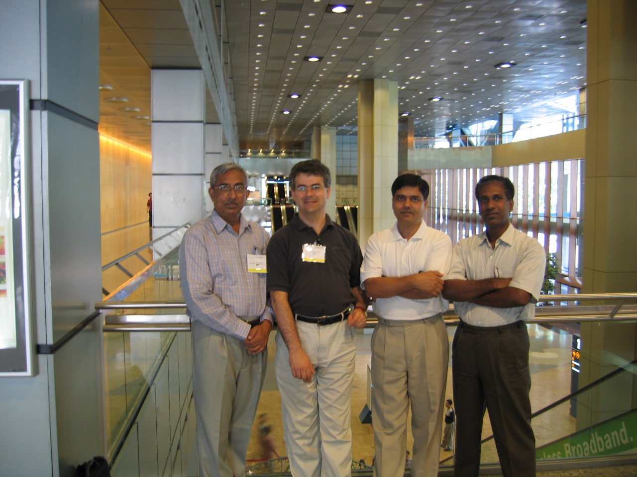 Snapshot of the scientific deliberation group at the Singapore Convention Centre during the conference proceedings.